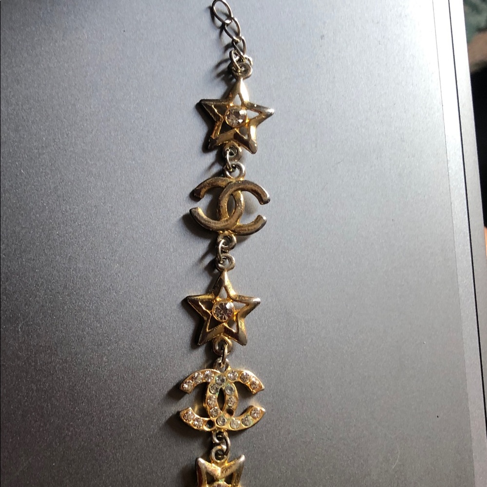 CC Gold Star & Double Cc Charm Bracelet 
COSTUME JEWELRY